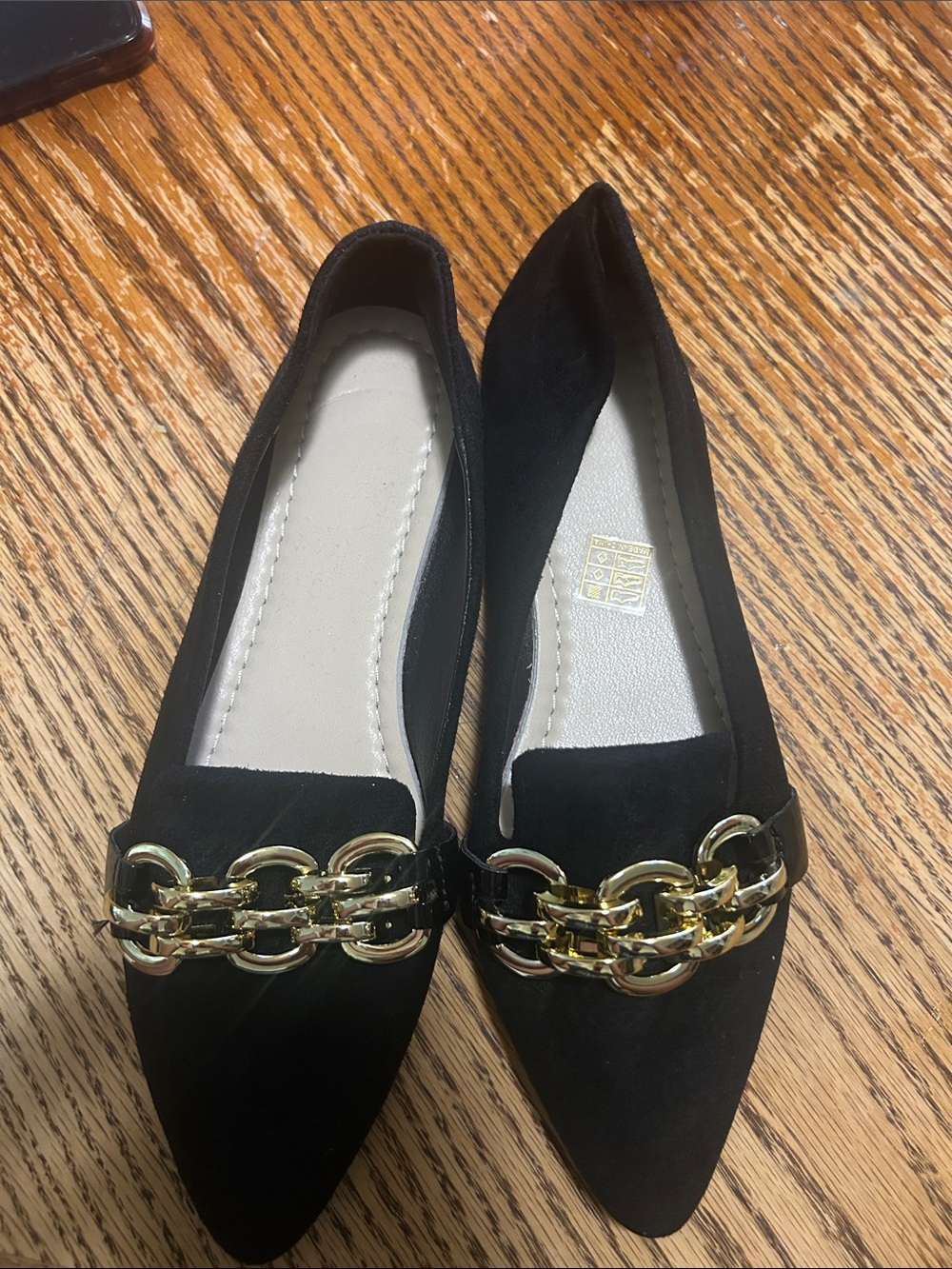 Women’s Black Pointed Flats with Gold Chain Accent